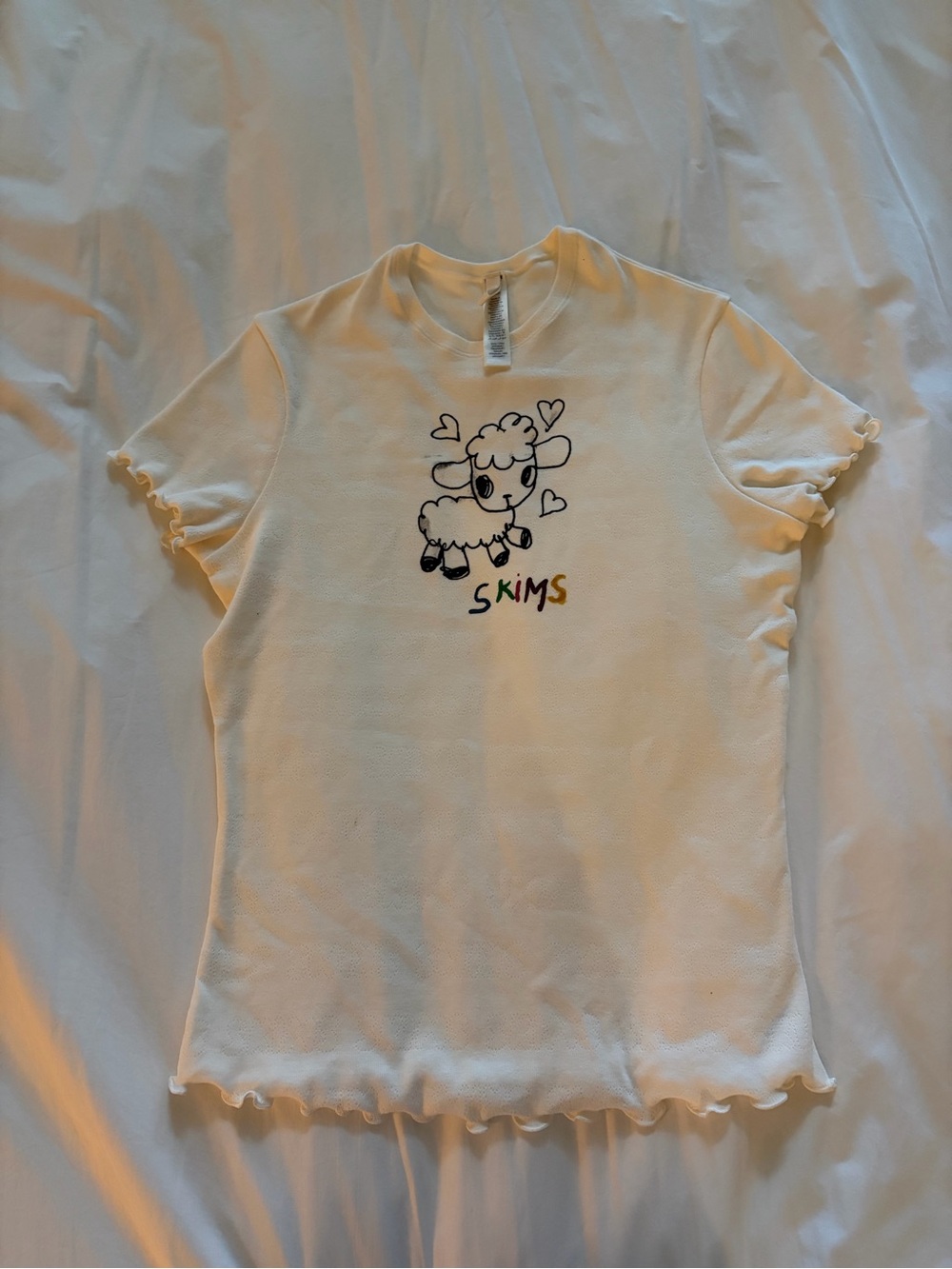 Skims Cream Tee with Lamb Graphic